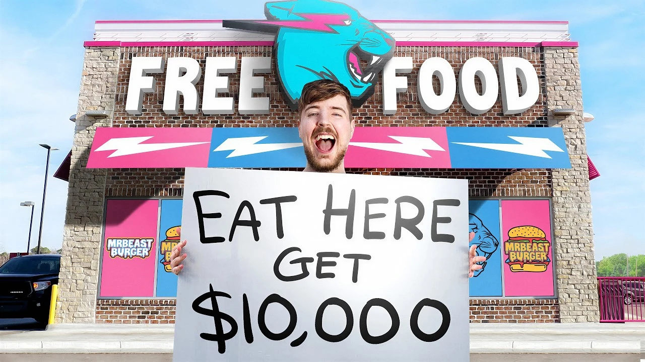 MrBeast holding a sign that reads Eat Here Get $10,000 outside a restaurant marked Free Food